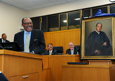  Left to right: Jeremy Collins, Henry Frye, Mark Martin, chief justice of the N.C. Supreme Court and Jack Boger