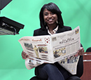 Student reading the NCAT award-winning student newspaper. 