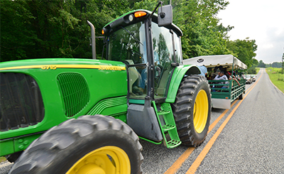 Tractor pulling guest during Small Farms Week