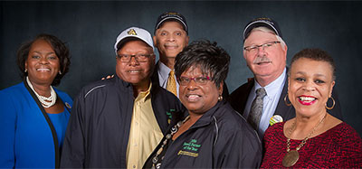 Dr. Rosalid Dale, intern administrator, The Cooperative extension Program at A&T., 2016 Small Farmers of the Year - Donnie and Alease Williams, (Behind the Williams's) Dr. Harold L. Martin Sr., Chancellor of N.C. A&T Univeristy, Steve Troxler, commissioner of agriculture, N.C. Department of Agriculture and Dr. Shirley Hymon-Parker, interim dean, School of Agriculture and Environmental Sciences, A&T