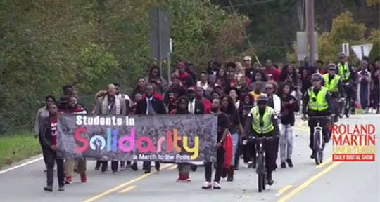 Students marching in the streets to the polls.